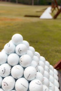 Golf balls stacked in a pyramid