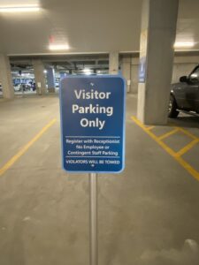 Visitor parking sign